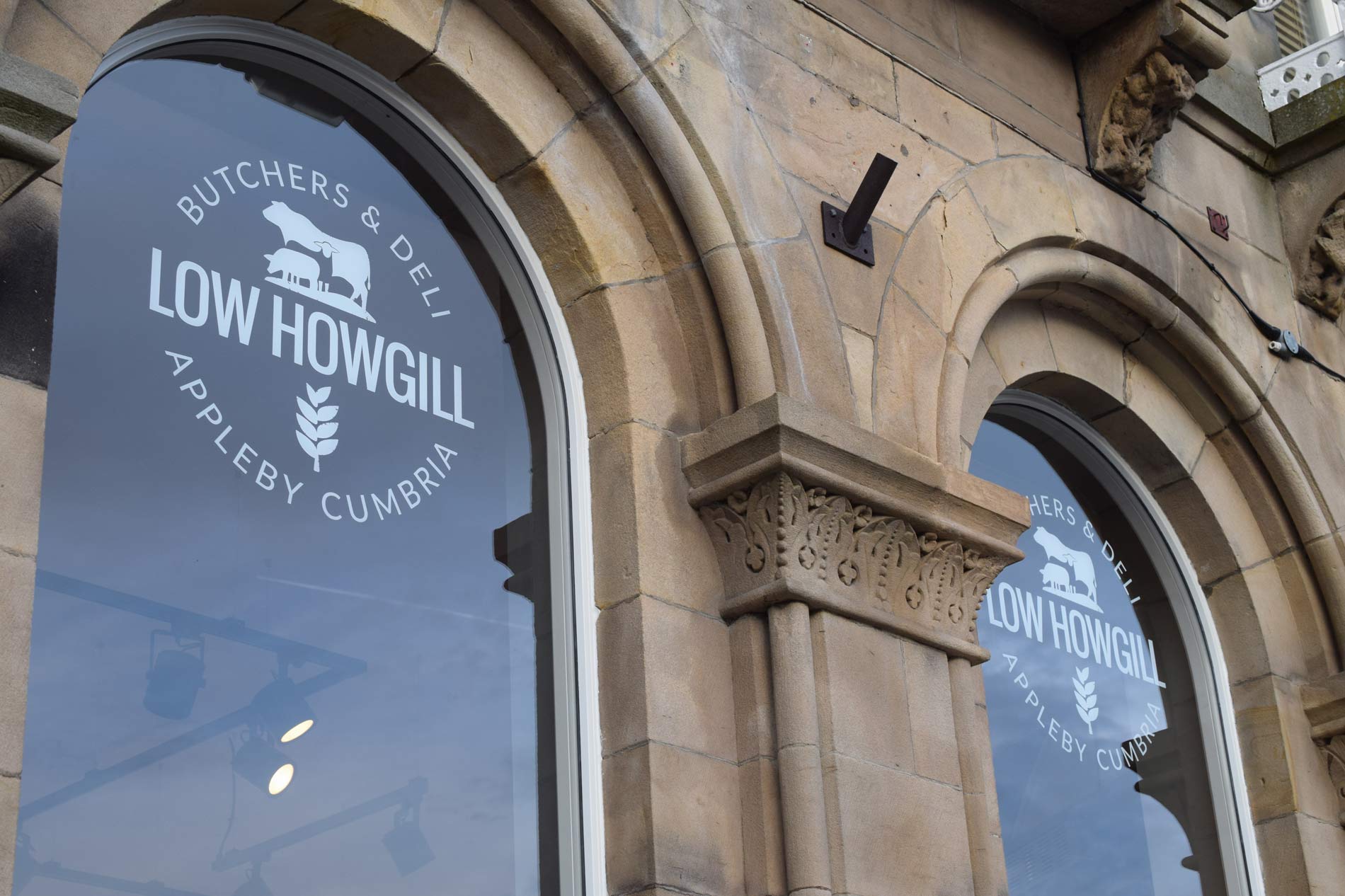 Low Howgill Butcher & Deli, Appleby, Cumbria logo branded windows